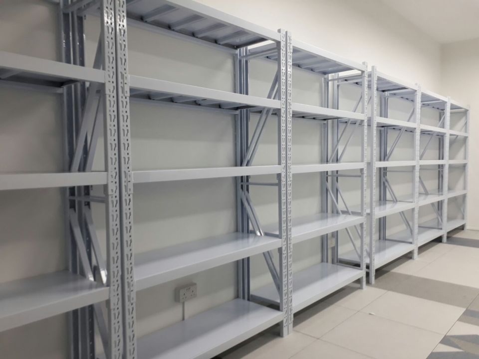 White boltless racks in a modern office storage room